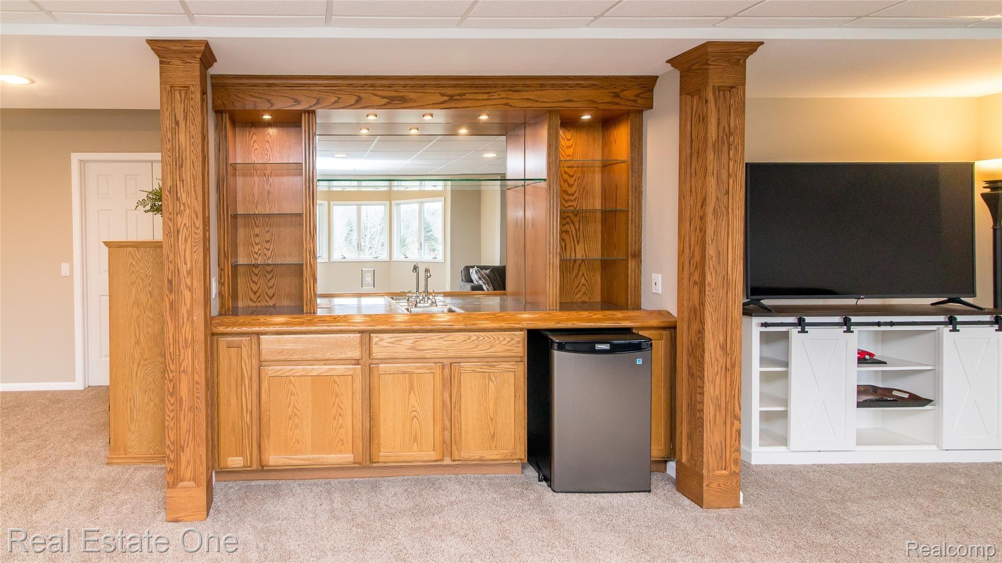 2610 Clivedon Road Howell, MI 48843 - Photo 37 of 43 beautifully built wet bar