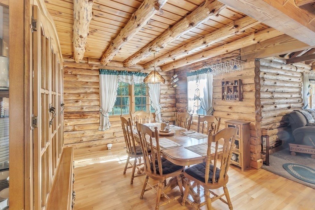 160 Laurel Hill Road Westhampton, MA 01027 - Photo 16 of 42 a view of a dining room with furniture and chandelier