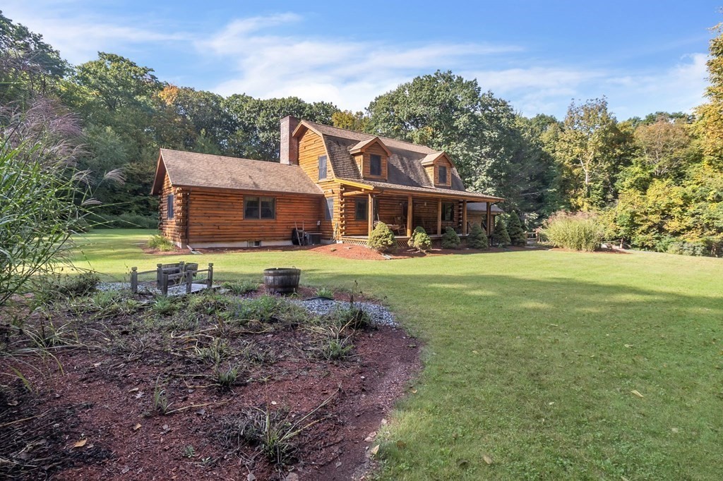 160 Laurel Hill Road Westhampton, MA 01027 - Photo 2 of 42 a front view of house with yard and green space