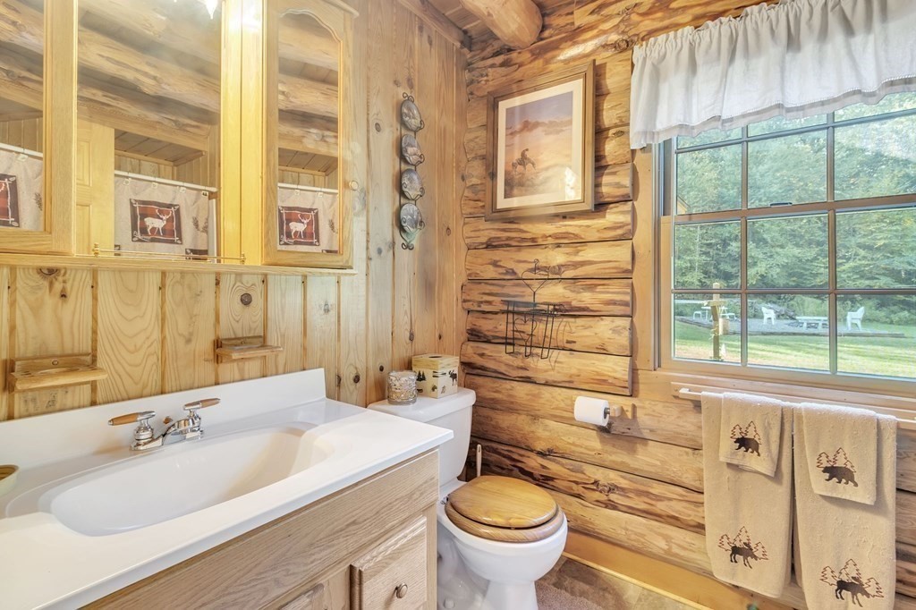 160 Laurel Hill Road Westhampton, MA 01027 - Photo 23 of 42 a bathroom with a granite countertop sink toilet and shower