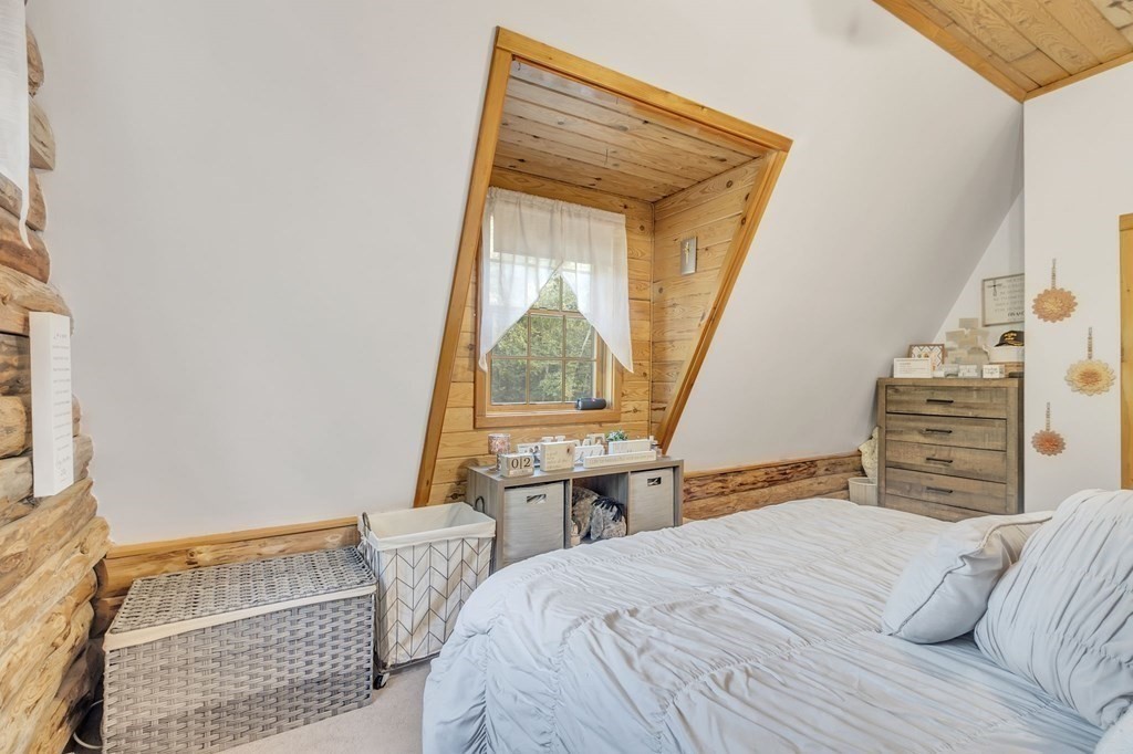 160 Laurel Hill Road Westhampton, MA 01027 - Photo 33 of 42 a bedroom with a bed and a window