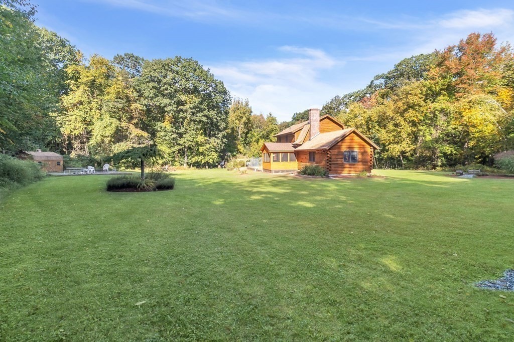 160 Laurel Hill Road Westhampton, MA 01027 - Photo 9 of 42 a view of a house with a big yard and large trees