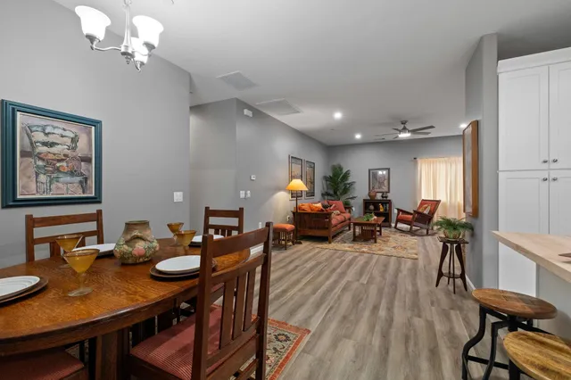 a bathroom with a sink toilet and a mirror