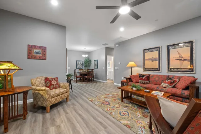 a living room with furniture and a window