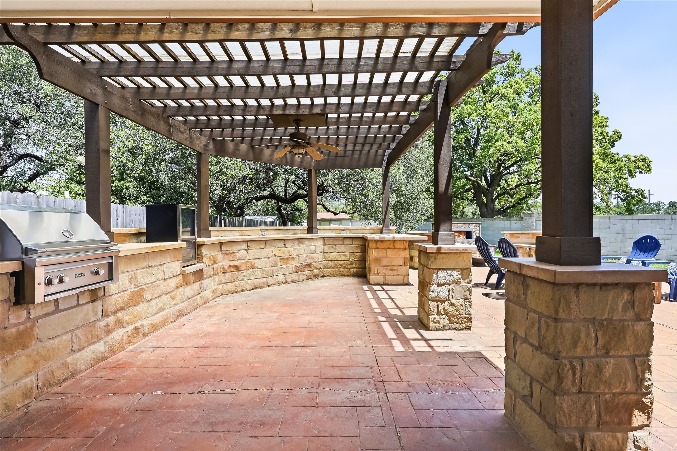 4400 Chickasaw Court Austin, TX 78749 - Photo 29 of 36 Covered patio with built-in grill and mini fridge