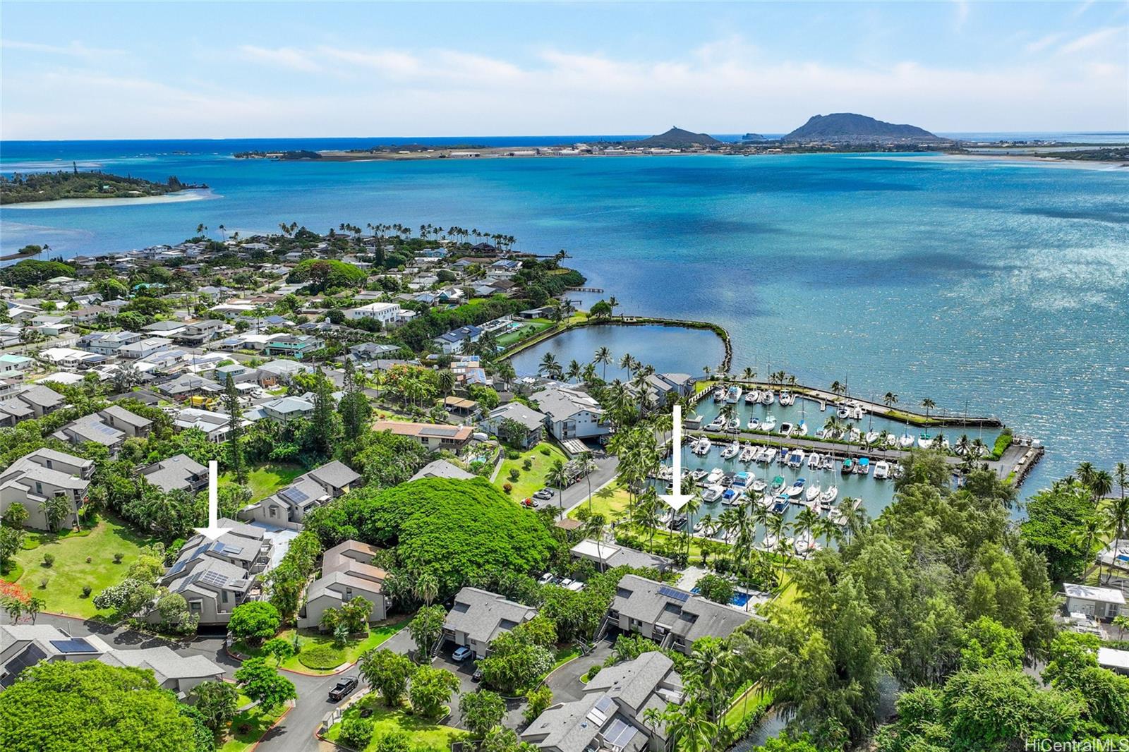 45-995 Wailele Road, Unit 29 Kaneohe, HI 96744 - Photo 1 of 25 a view of a lake with a mountain in the background