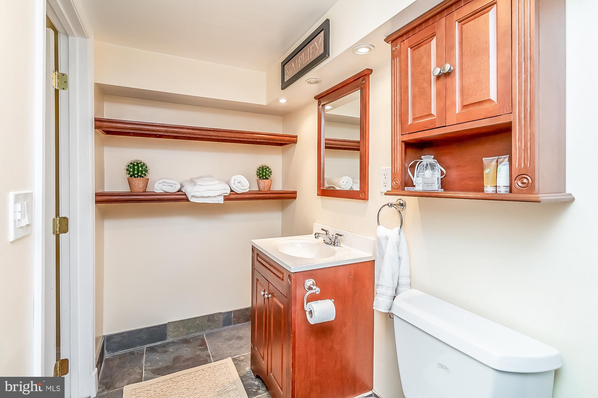 6211 Ridgeview Avenue Baltimore, MD 21206 - Photo 54 of 88 BUILT IN SHELVING
SLATE FLOOR