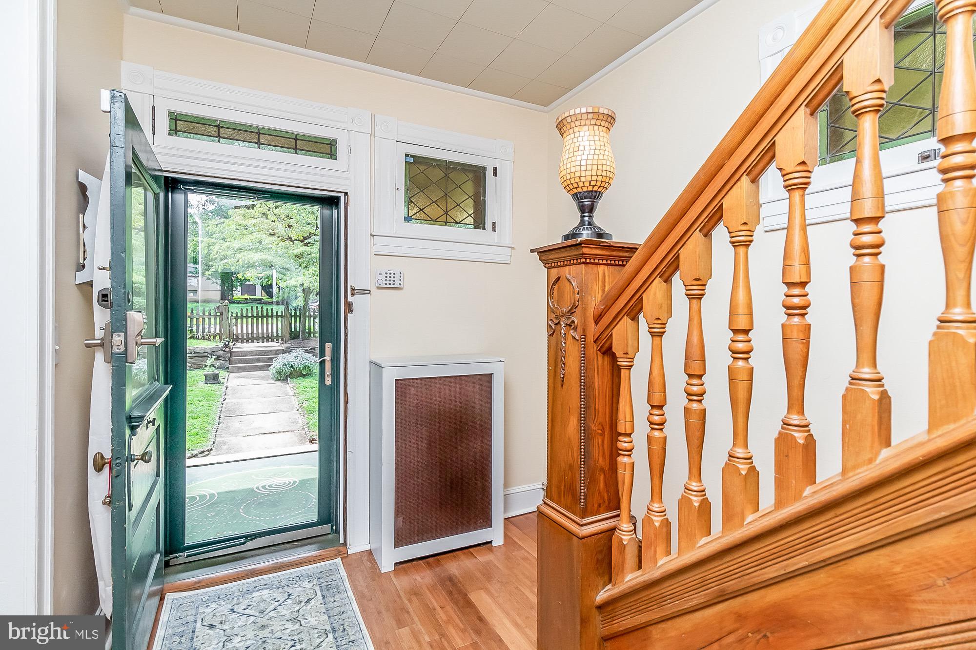 6211 Ridgeview Avenue Baltimore, MD 21206 - Photo 9 of 88 FOYER ORIGINAL STAINED GLASS TRANSOM WINDOWS