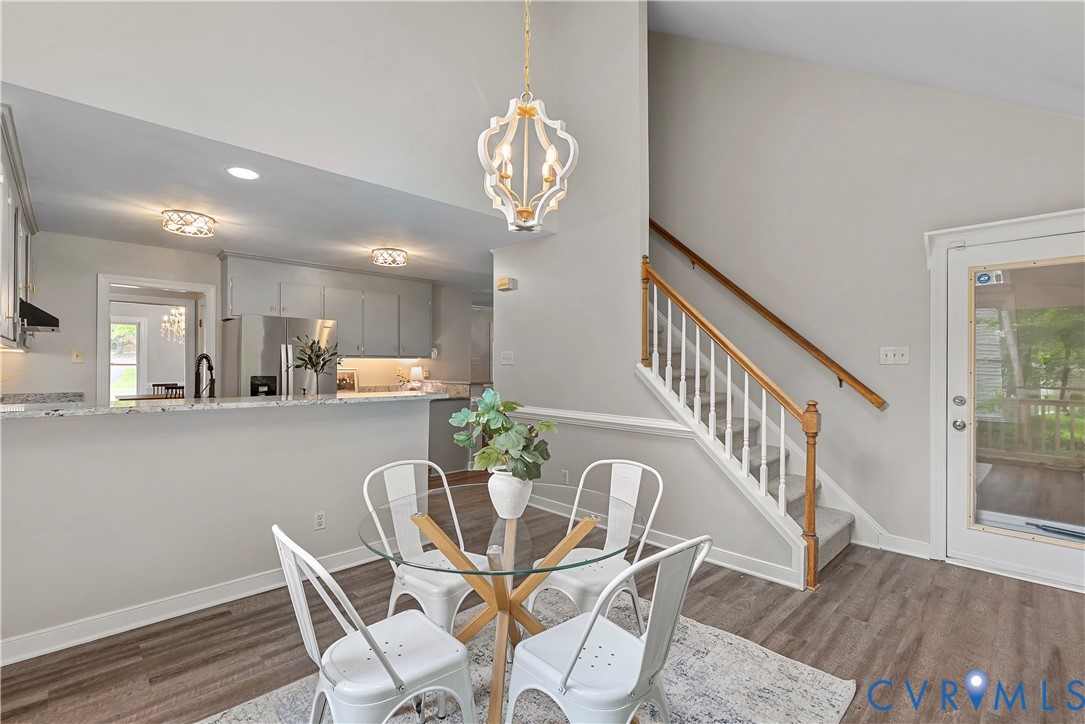 14308 Chimney House Road Midlothian, VA 23112 - Photo 24 of 52 Open-concept living area featuring wood-finish flo