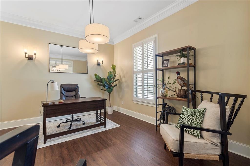 2995 Gum Creek Road Oxford, GA 30054 - Photo 18 of 51 a living room with furniture and a wooden floor