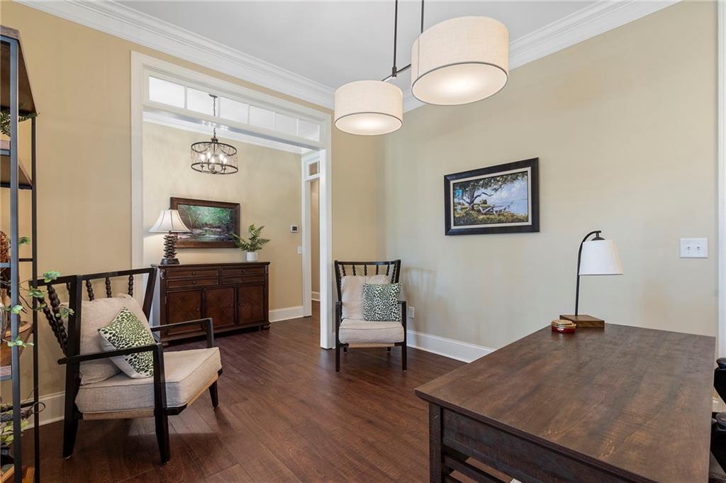 2995 Gum Creek Road Oxford, GA 30054 - Photo 19 of 51 a view of a dining room with furniture and wooden floor