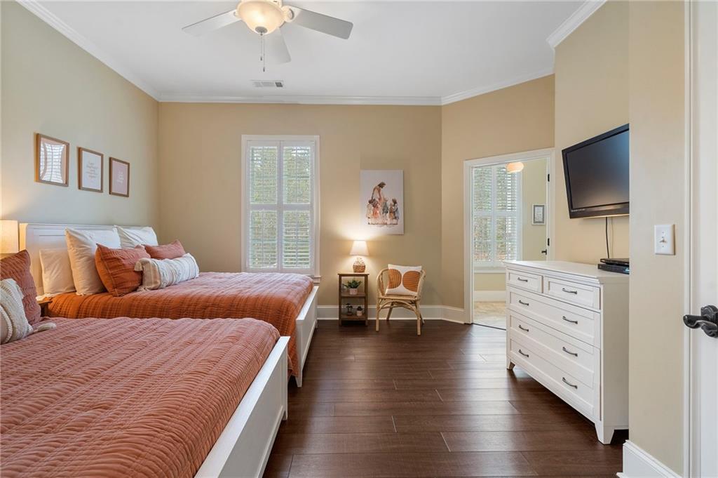 2995 Gum Creek Road Oxford, GA 30054 - Photo 29 of 51 a bedroom with furniture and a flat screen tv