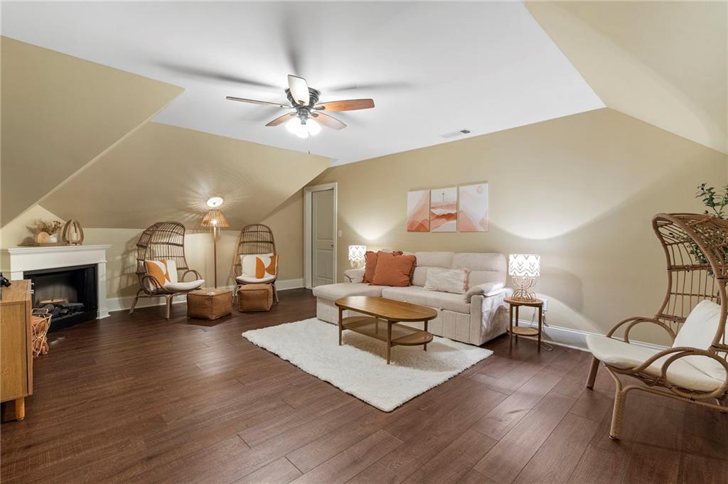2995 Gum Creek Road Oxford, GA 30054 - Photo 31 of 59 a living room with furniture or couch and a fireplace