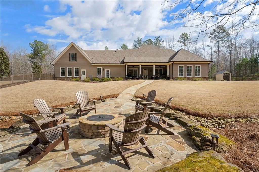 2995 Gum Creek Road Oxford, GA 30054 - Photo 45 of 59 a front view of house with yard and trees around