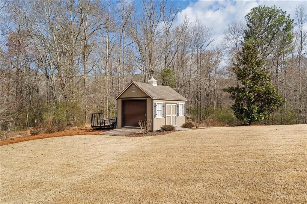 2995 Gum Creek Road Oxford, GA 30054 - Photo 51 of 59 a front view of a house with a yard