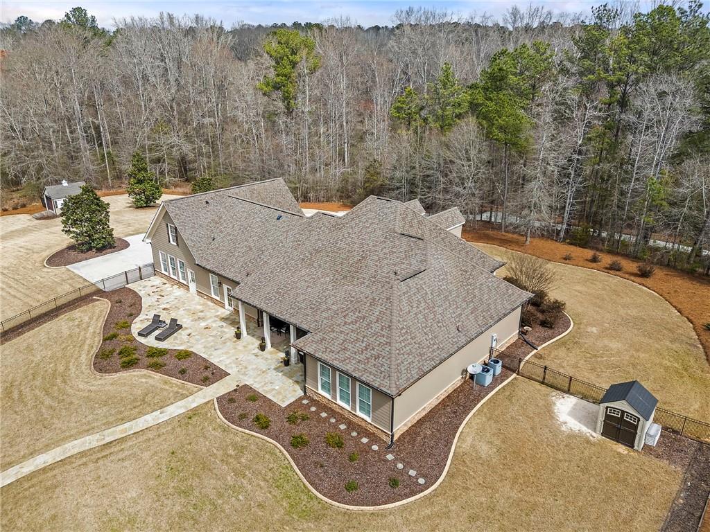 2995 Gum Creek Road Oxford, GA 30054 - Photo 52 of 59 an aerial view of a house with swimming pool and mountains