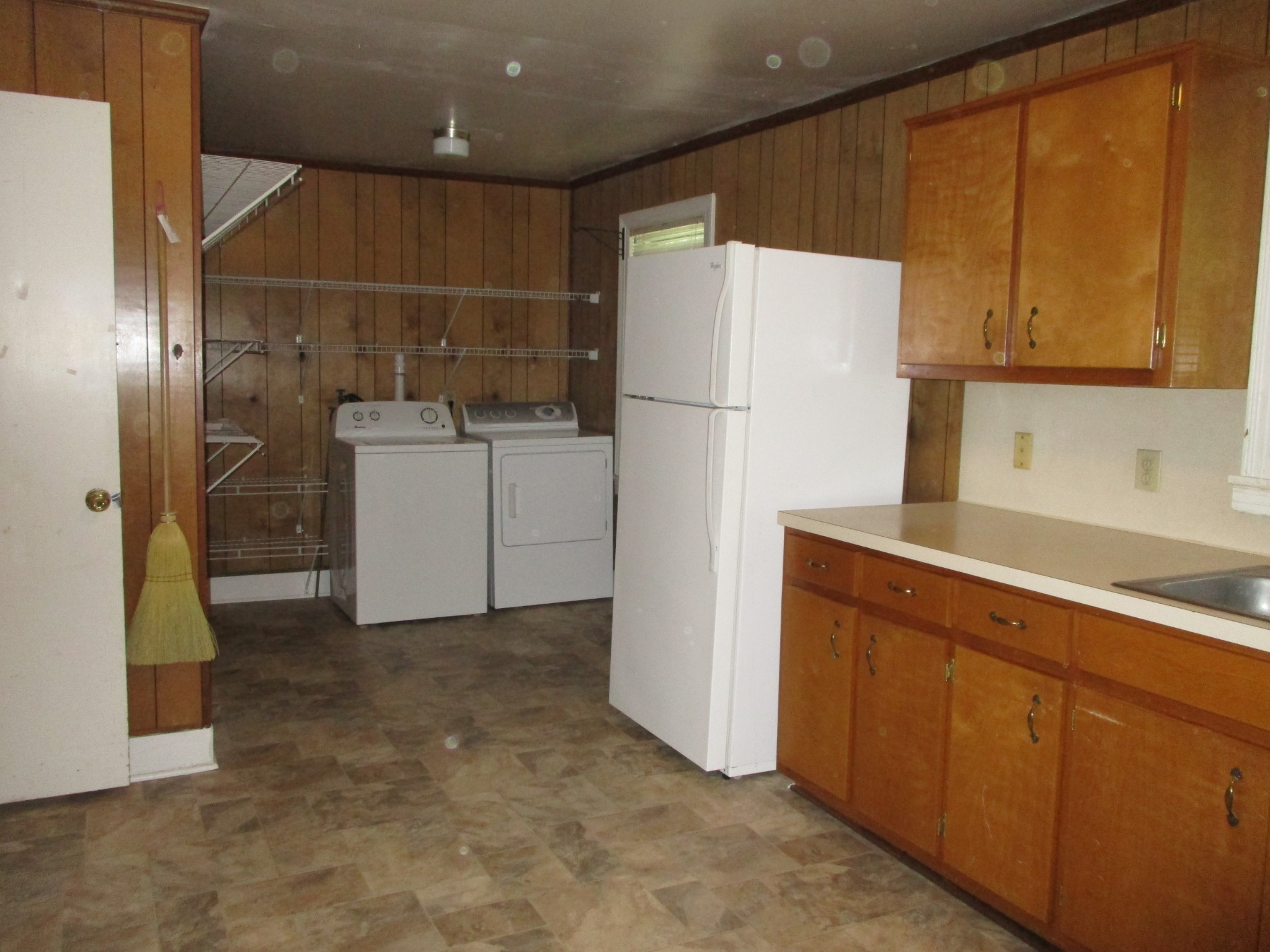 1003 Hickory Ridge Road Lebanon, TN 37087 - Photo 10 of 18 a kitchen with refrigerator and cabinets