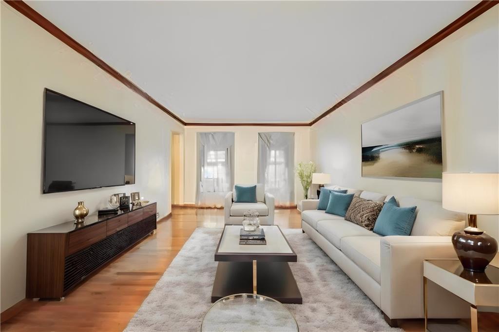 220 Tiffany Irwin, PA 15642 - Photo 13 of 39 a living room with furniture and a flat screen tv