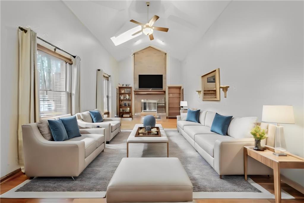 220 Tiffany Irwin, PA 15642 - Photo 15 of 39 a living room with furniture fireplace and a large window