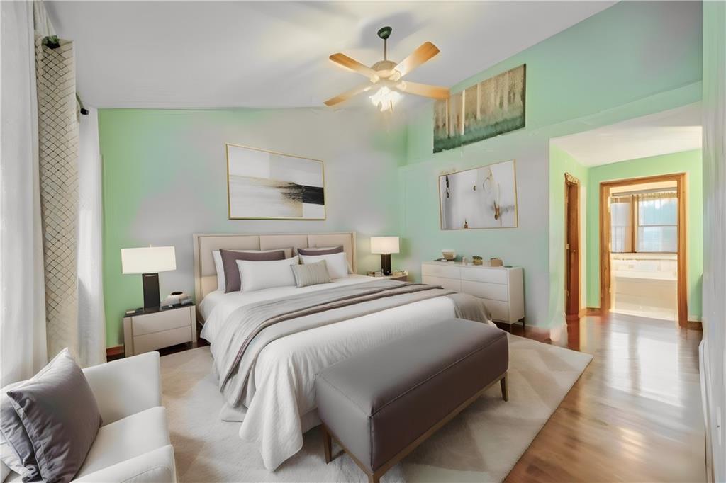 220 Tiffany Irwin, PA 15642 - Photo 16 of 39 a bedroom with bed and a chandelier