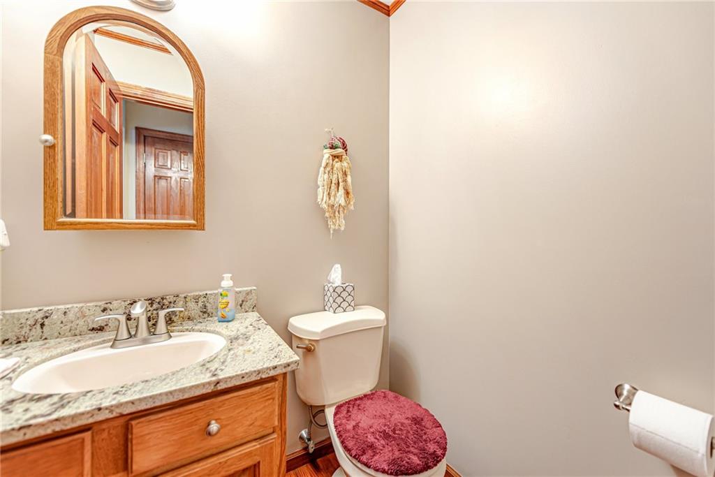 220 Tiffany Irwin, PA 15642 - Photo 20 of 39 a bathroom with a granite countertop sink mirror vanity and toilet