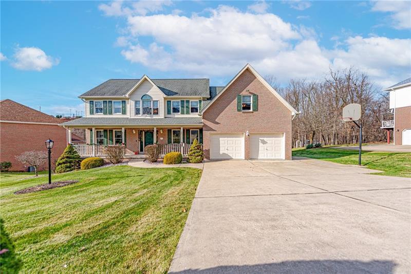220 Tiffany Irwin, PA 15642 - Photo 2 of 39 a front view of a house with a yard
