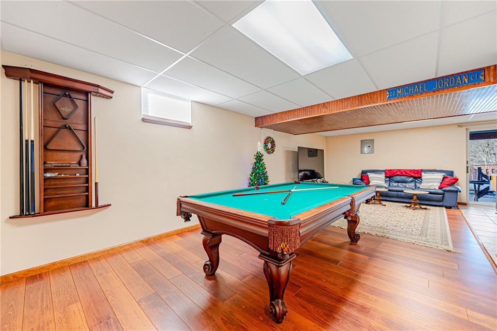 220 Tiffany Irwin, PA 15642 - Photo 28 of 39 a room with furniture and pool table wooden floor