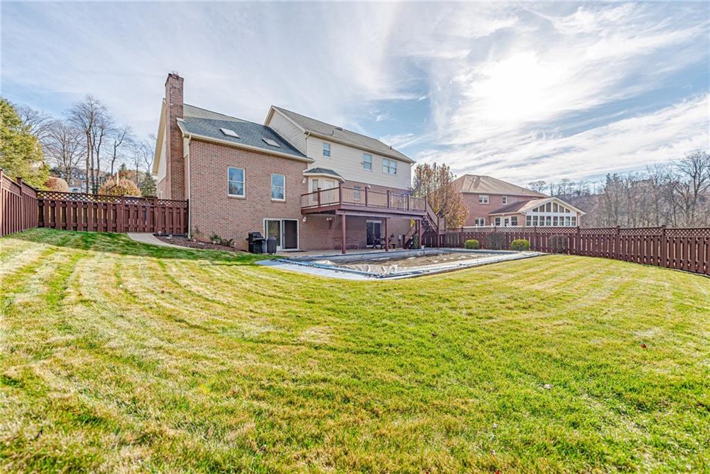 220 Tiffany Irwin, PA 15642 - Photo 37 of 39 a swimming pool with outdoor seating and yard