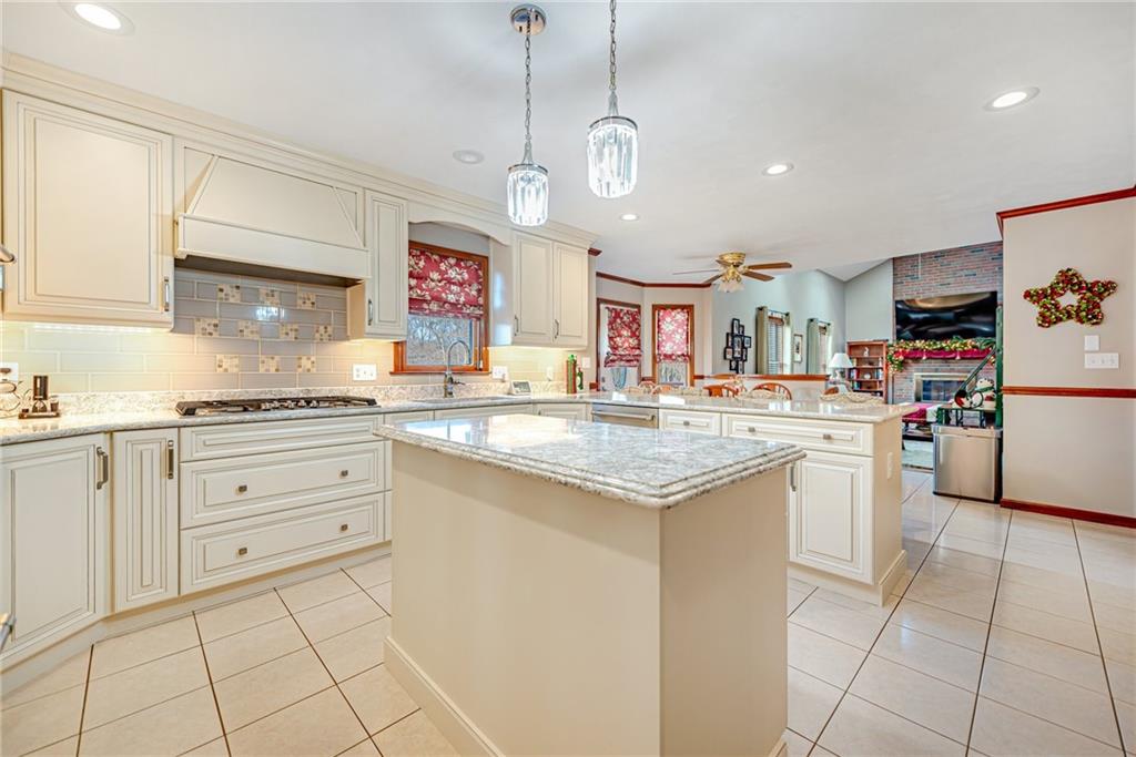 220 Tiffany Irwin, PA 15642 - Photo 8 of 39 a kitchen with cabinets and window