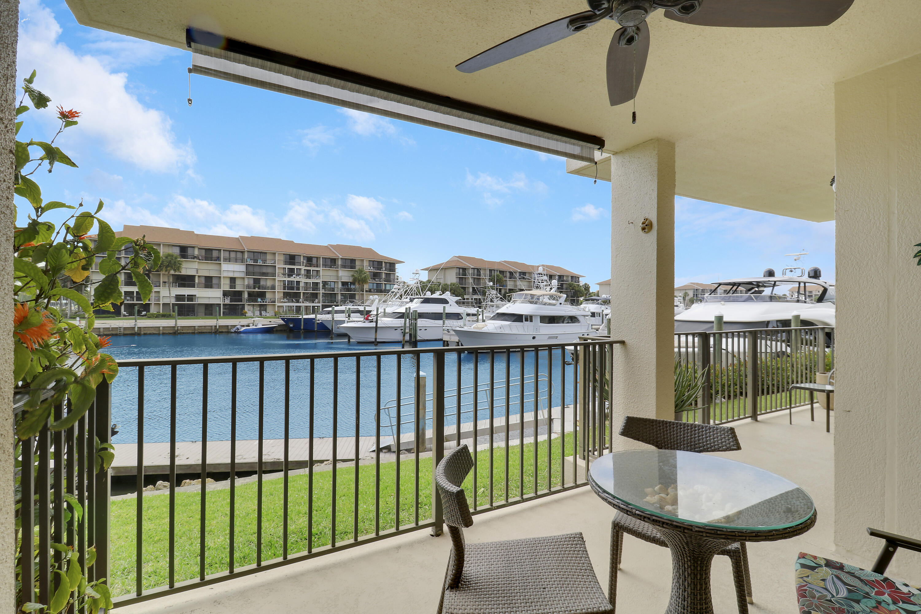 1301 Seafarer Circle, Unit 105 Jupiter, FL 33477 - Photo 12 of 37 Extended Patio Behind Primary