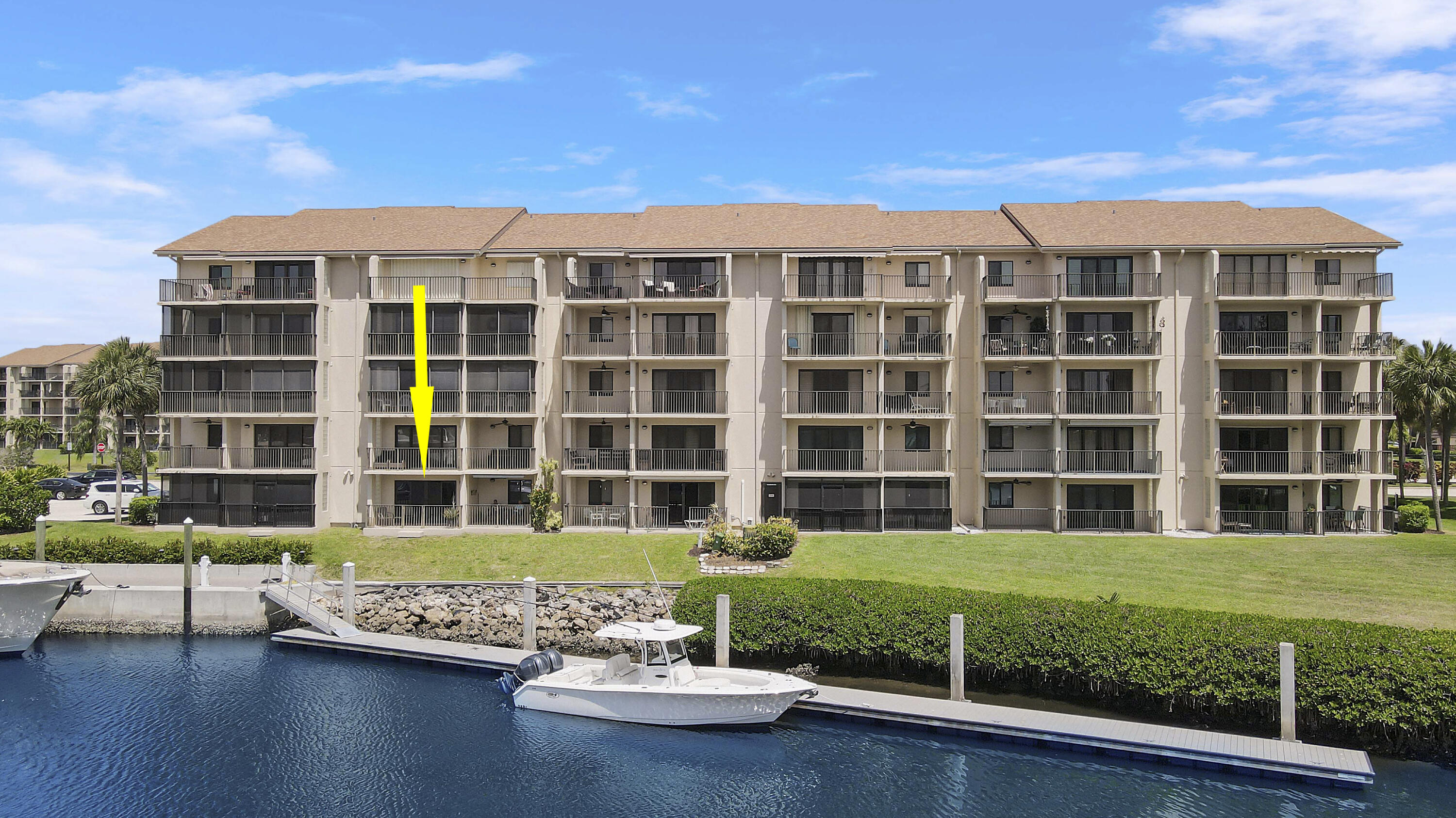 1301 Seafarer Circle, Unit 105 Jupiter, FL 33477 - Photo 31 of 37 Dock right behind Extended Patio