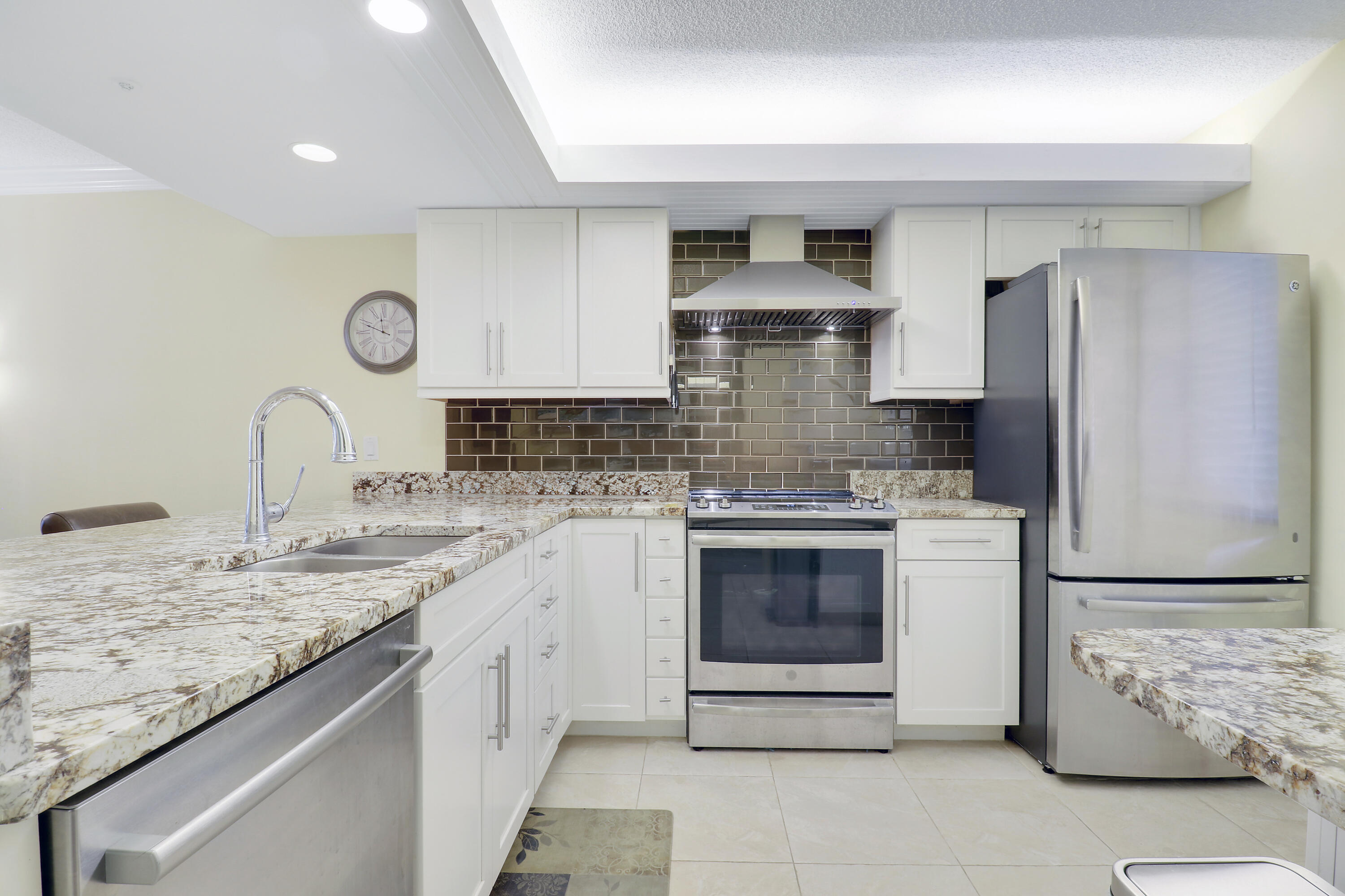 1301 Seafarer Circle, Unit 105 Jupiter, FL 33477 - Photo 5 of 37 Updated Kitchen