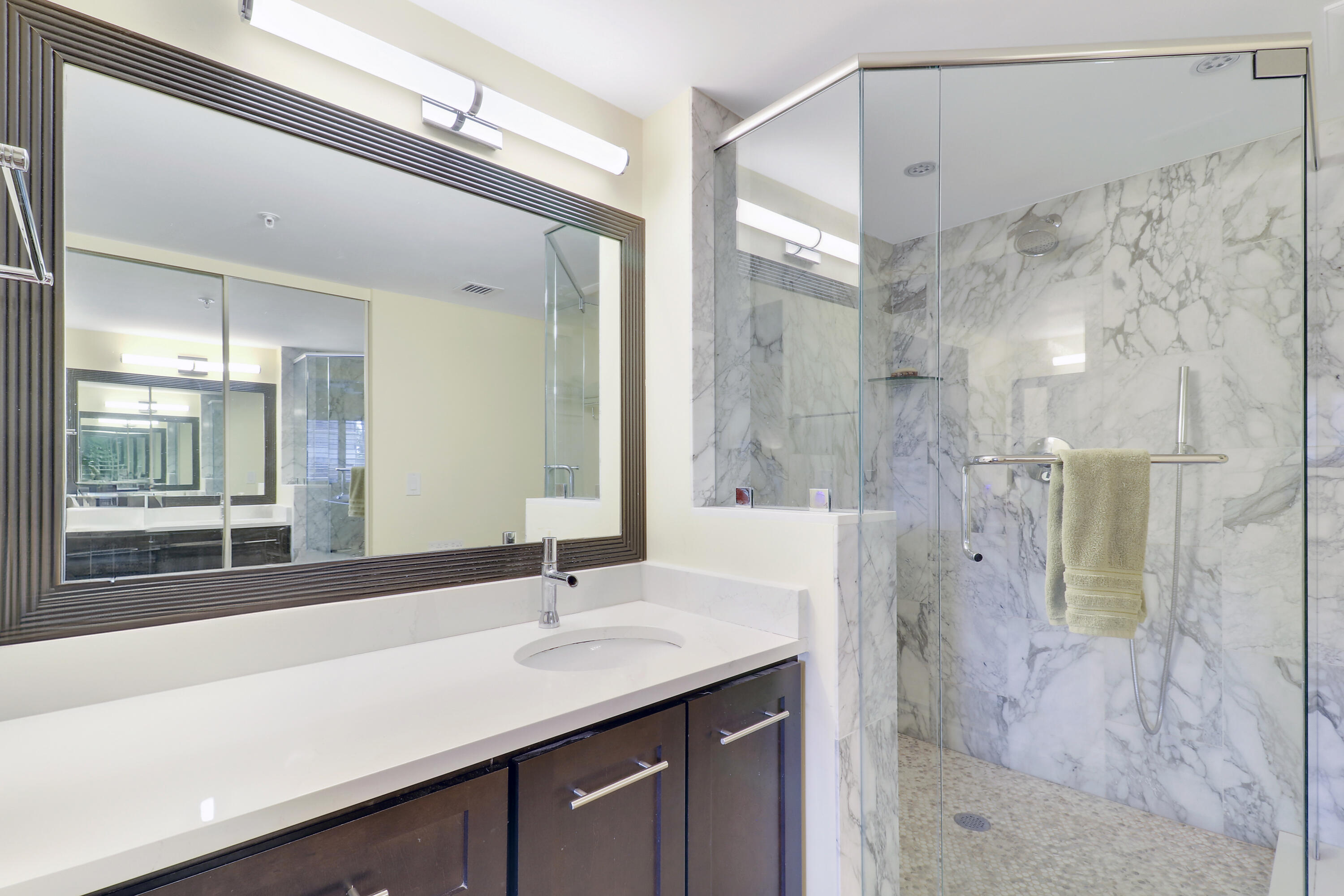 1301 Seafarer Circle, Unit 105 Jupiter, FL 33477 - Photo 9 of 37 Primary Bath