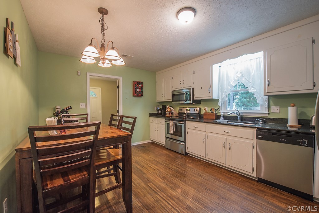 12109 Bundle Road Chesterfield, VA 23838 - Photo 8 of 31 Eat-in kitchen with granite, white countertops, an