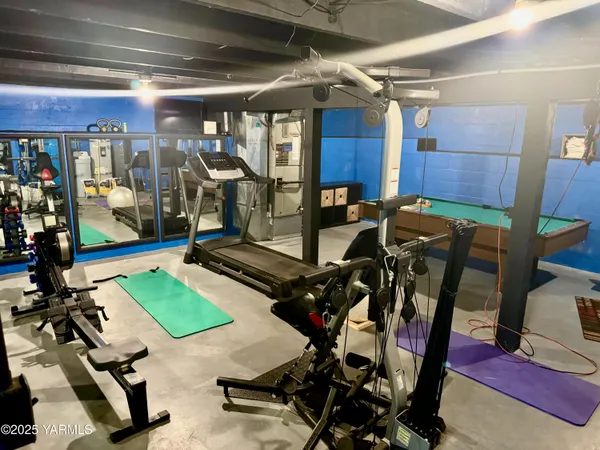a view of a room with gym equipment