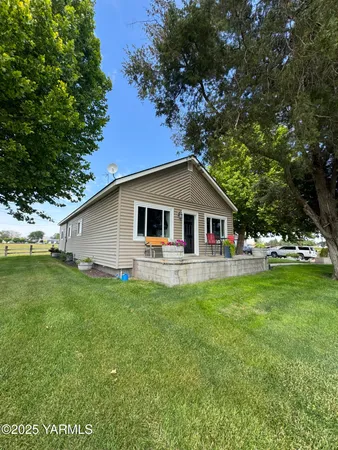 a house view with a garden space