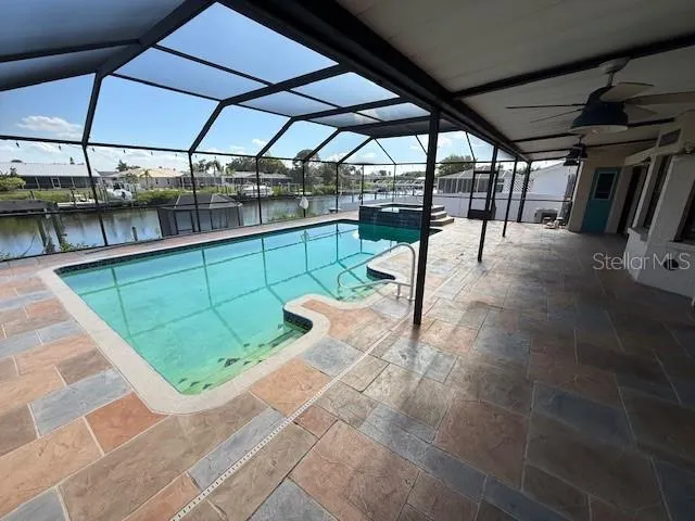 a view of a swimming pool with a porch