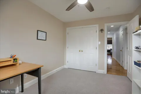 a view of a workspace with furniture