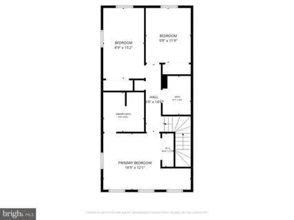 a picture of a bench in front of a wall