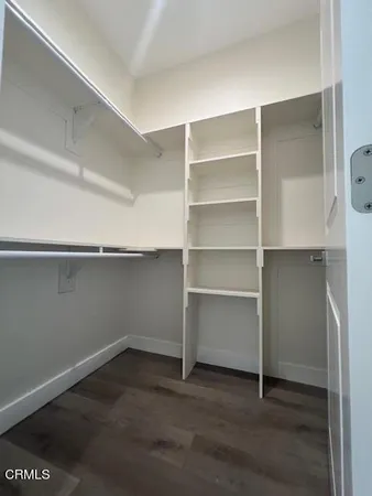 a view of an empty walk in closet