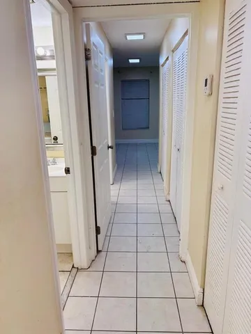 a view of backyard with a small cabin