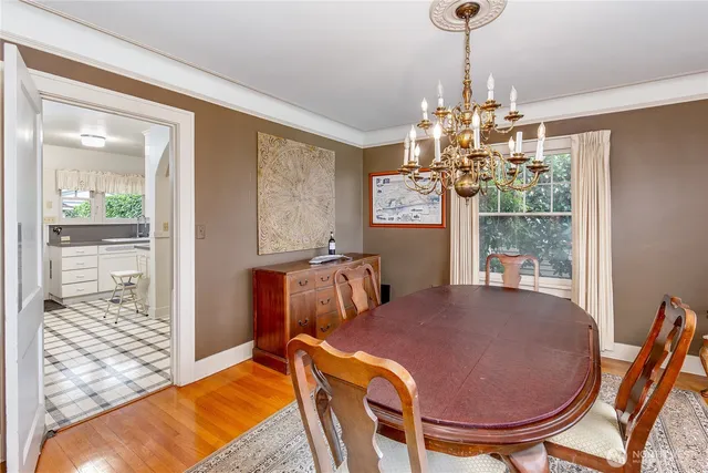 a view of a dining room with furniture window and outside view