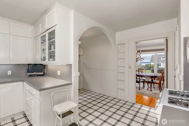 a kitchen with a cabinets and outdoor view