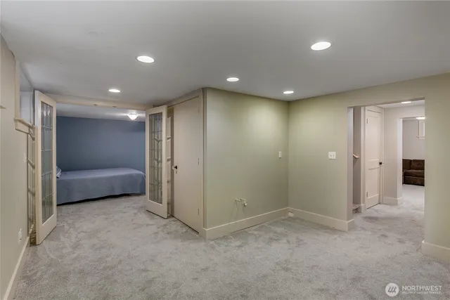 a en suite bathroom with a sink and a mirror