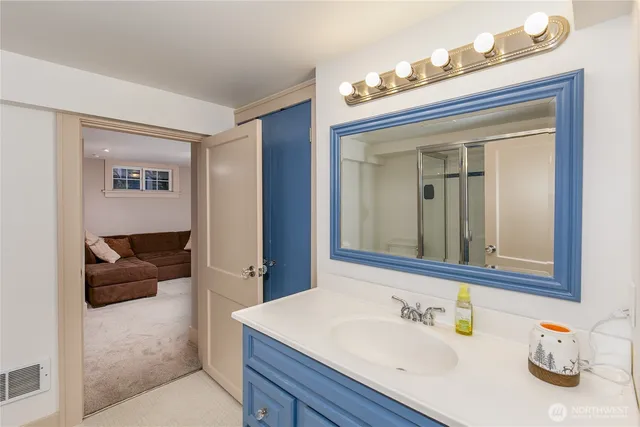 a utility room with sink dryer and washer
