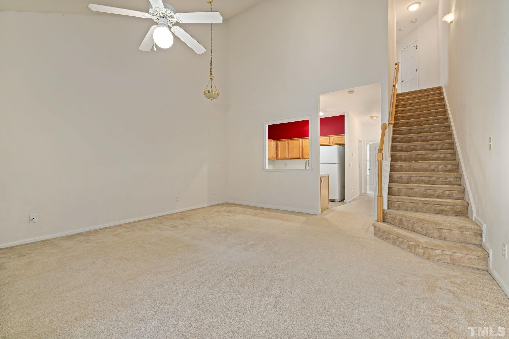 33 Signet Drive Durham, NC 27705 - Photo 19 of 37 en empty room with white walls and ceiling fan