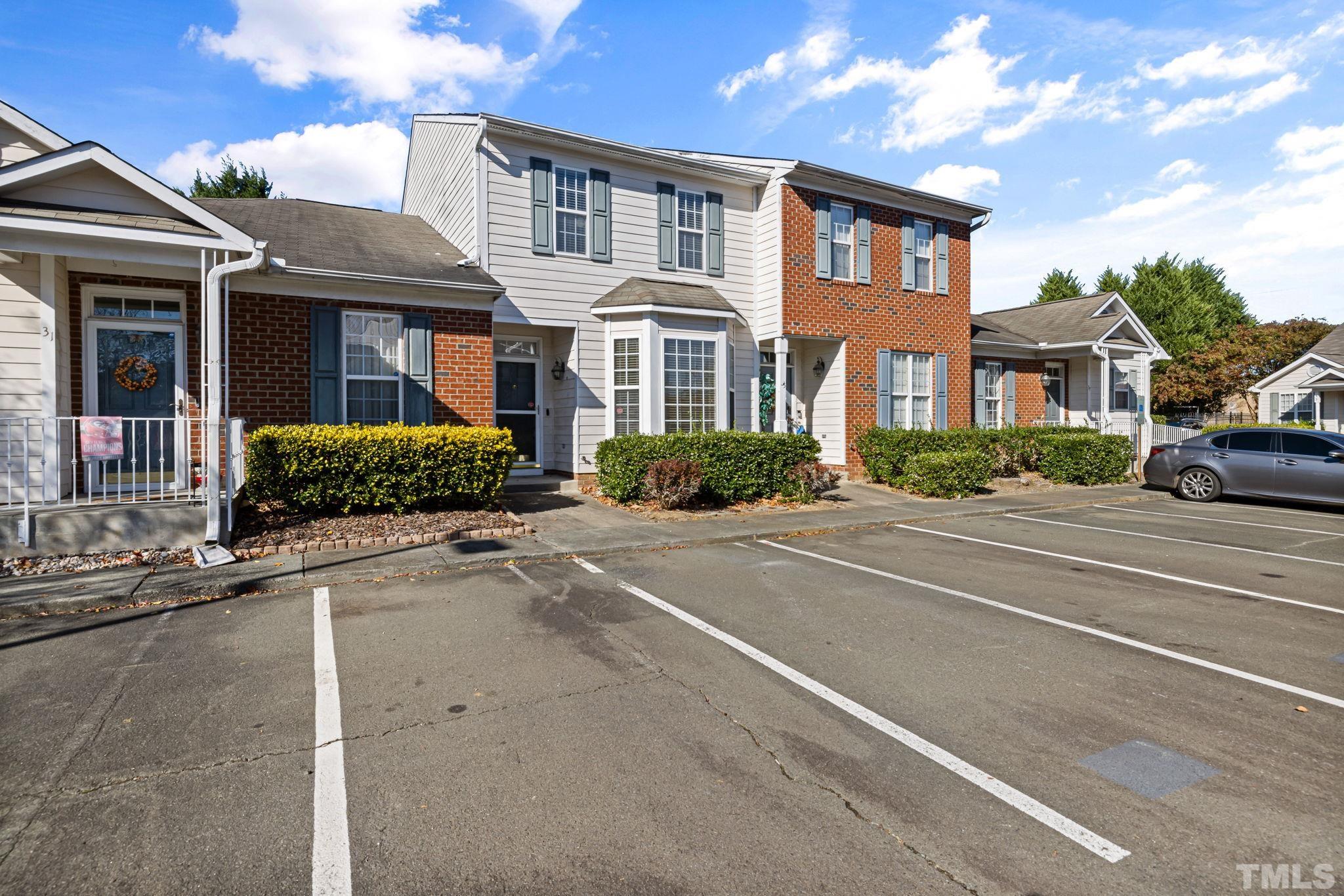33 Signet Drive Durham, NC 27705 - Photo 2 of 37 a front view of a house with a yard