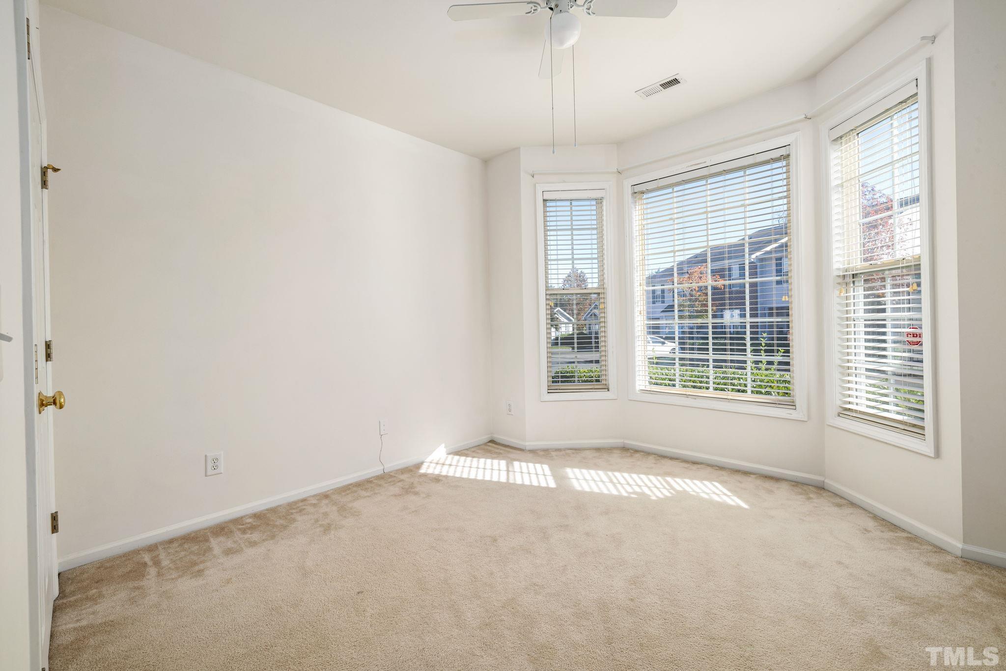 33 Signet Drive Durham, NC 27705 - Photo 23 of 37 a view of an empty room with a window