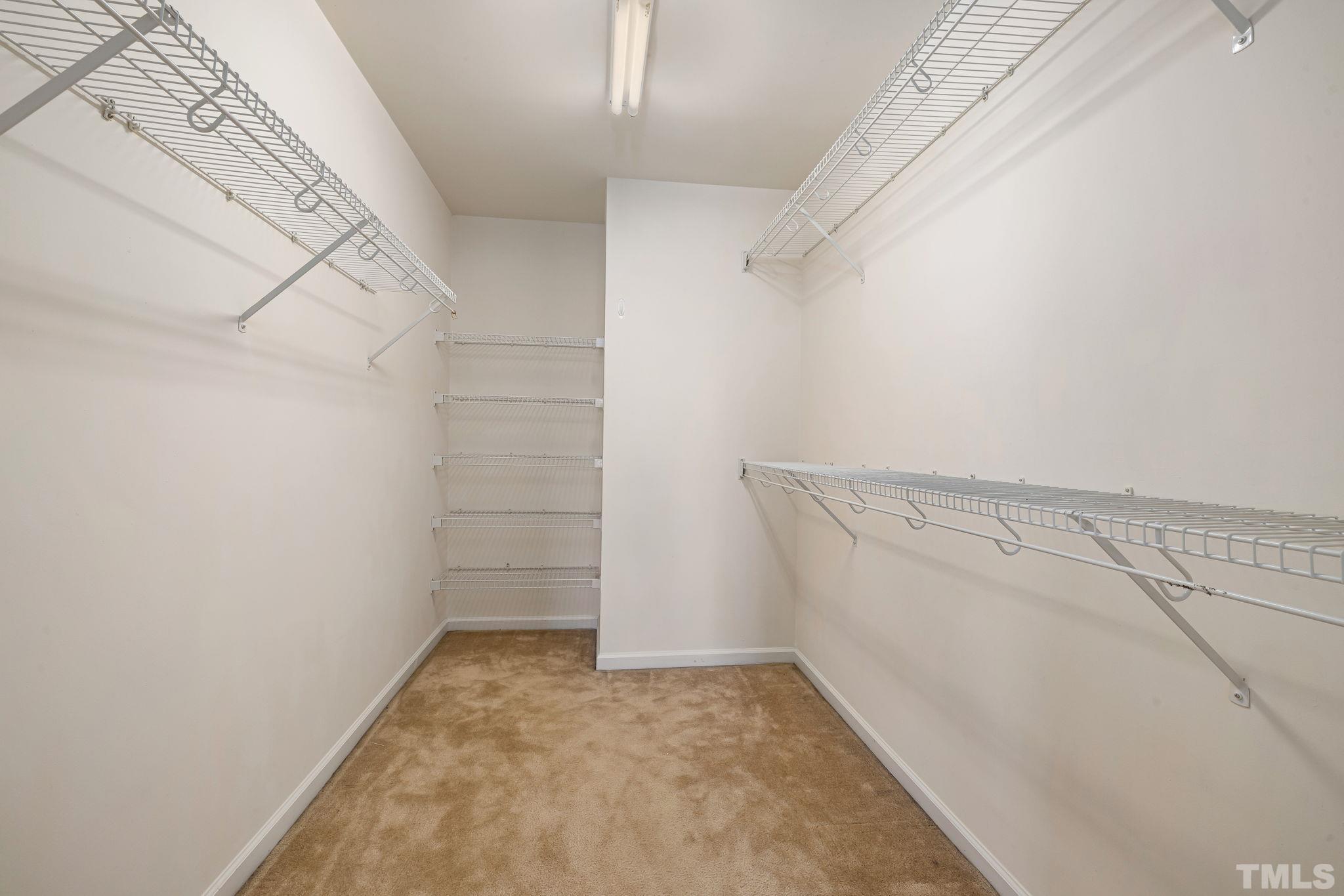 33 Signet Drive Durham, NC 27705 - Photo 33 of 37 a view of a room with racks on the wall