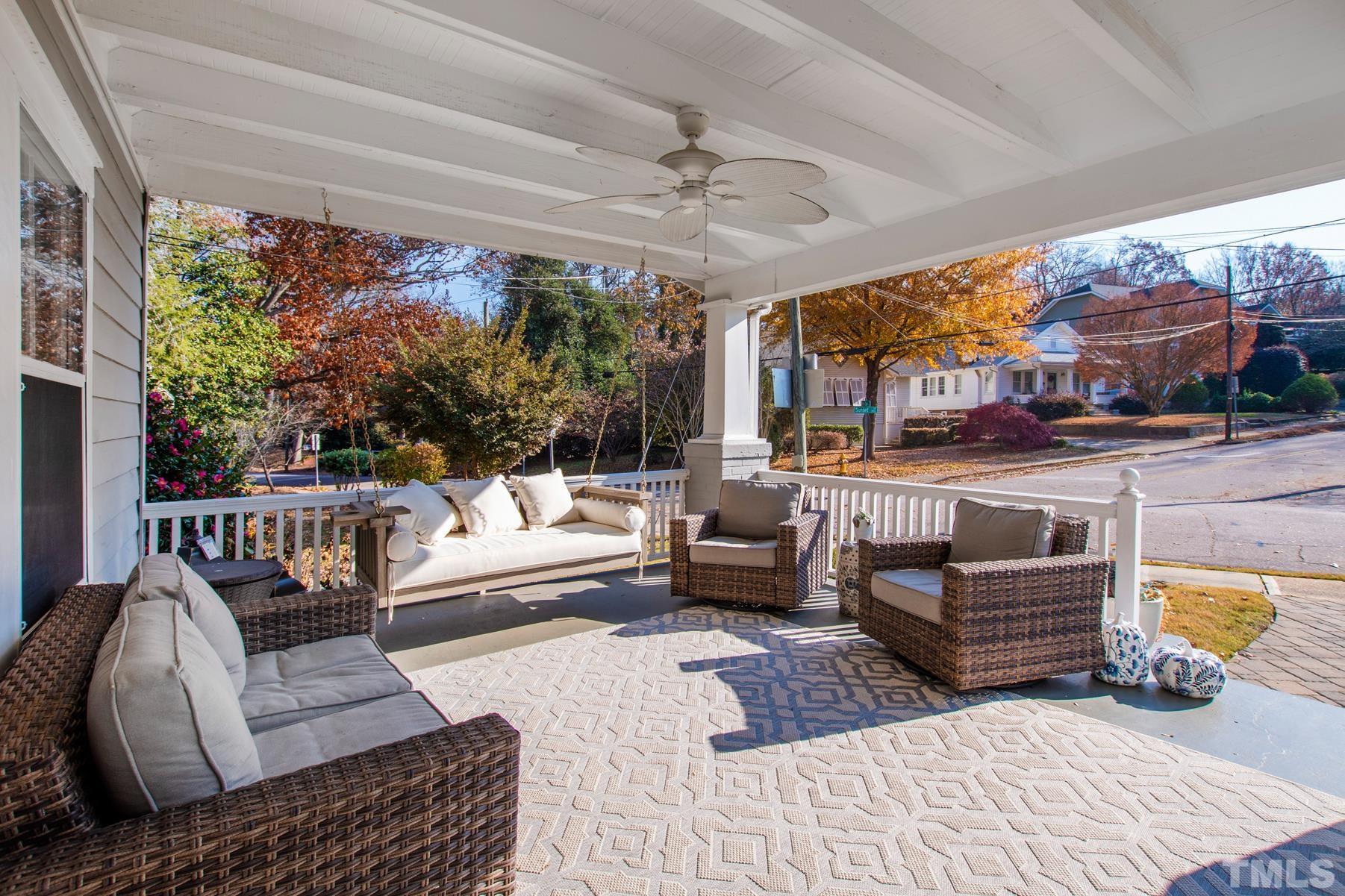 1835 White Oak Road Raleigh, NC 27608 - Photo 4 of 35 a outdoor living space with furniture and a fireplace